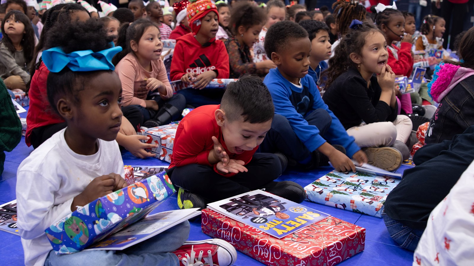 Bryant kindergarten students receive gifts.